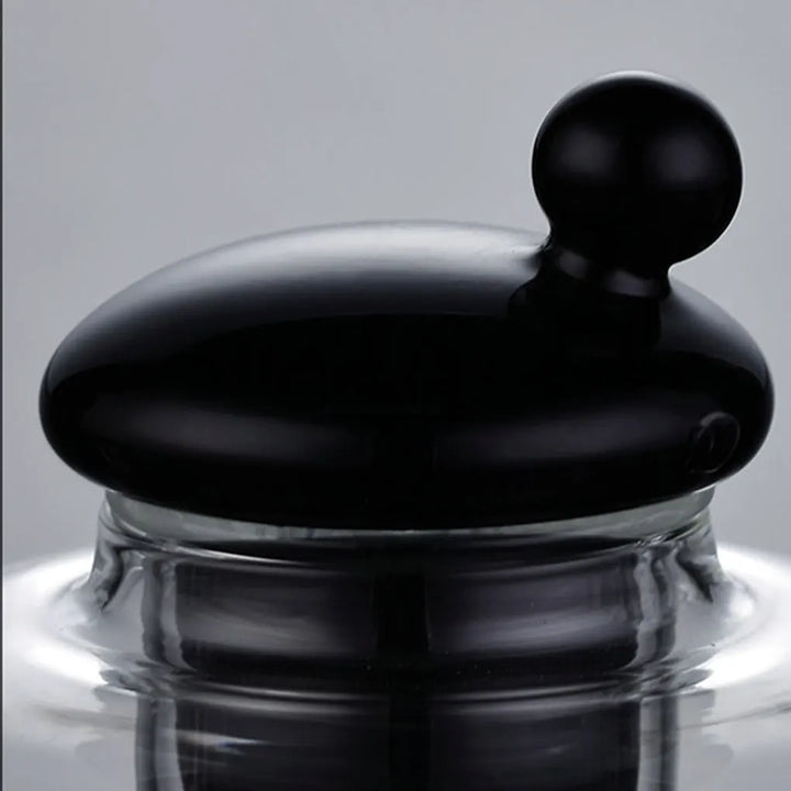 Heat-resistant glass teapot with tea divider