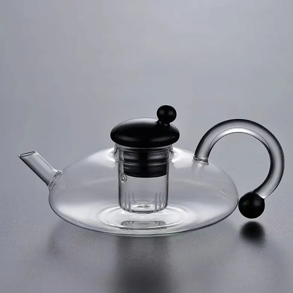 Heat-resistant glass teapot with tea divider