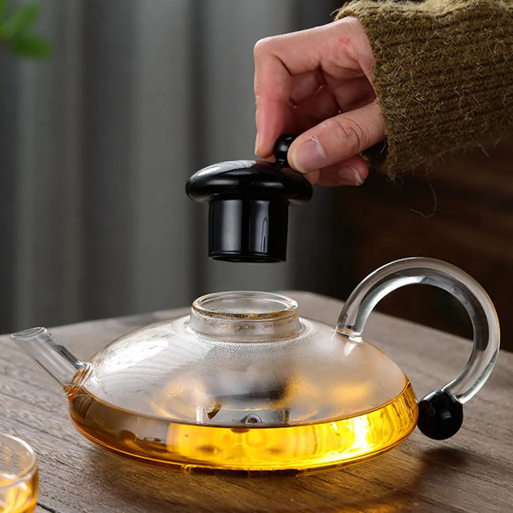 Heat-resistant glass teapot with tea divider