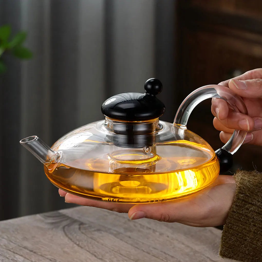Heat-resistant glass teapot with tea divider