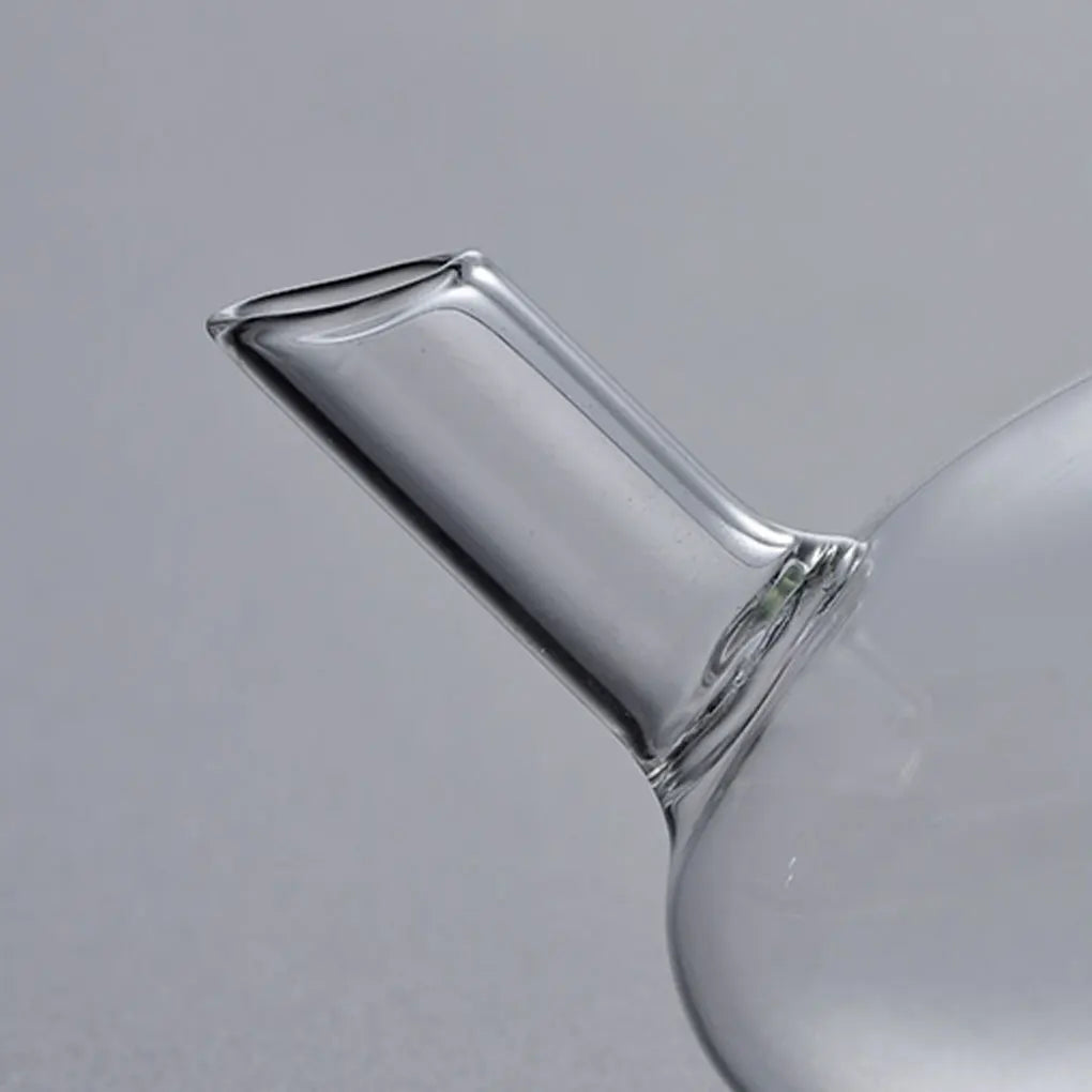 Heat-resistant glass teapot with tea divider